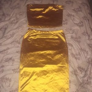 A gold long shirk set
